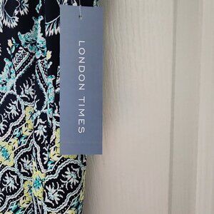 Long double split front dress by London Times. Brand new